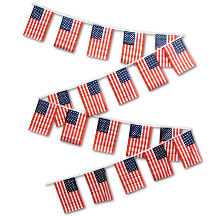 Patriotic streamers with multiple American flags on a white background, dealership decor