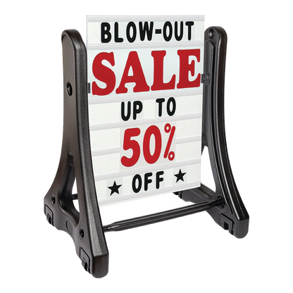 Black swinger sidewalk sign with Blow-Out Sale Up To 50% Off panel