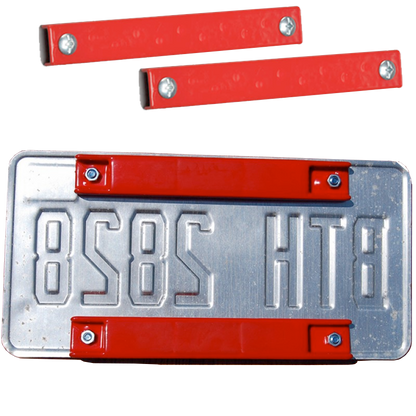 Red rubber-coated magnetic license plate holders attached to a metal plate